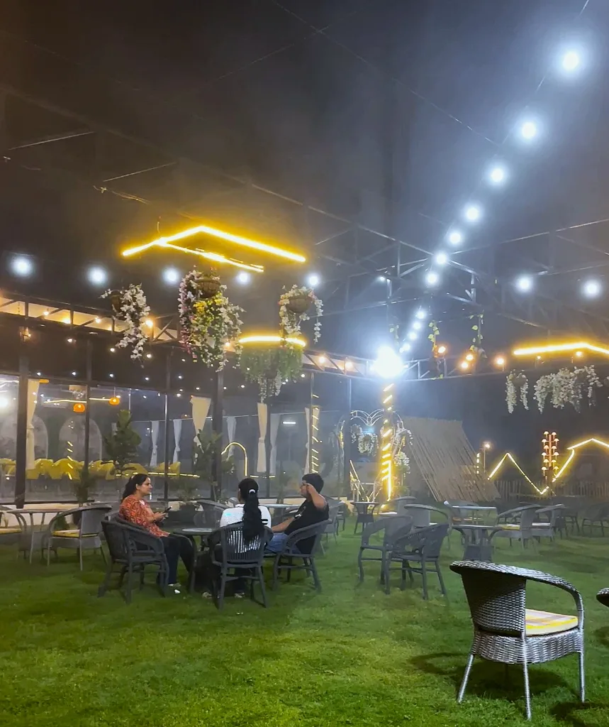 Family Outdoor Dinner Under String Lights