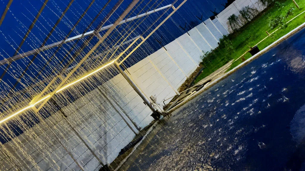 Night Swimming Pool Rain Sprinkler Experience